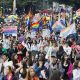 Personas participan en la marcha del Día del Orgullo LGTBI este domingo, en Bogotá (Colombia). EFE/ Carlos Ortega
