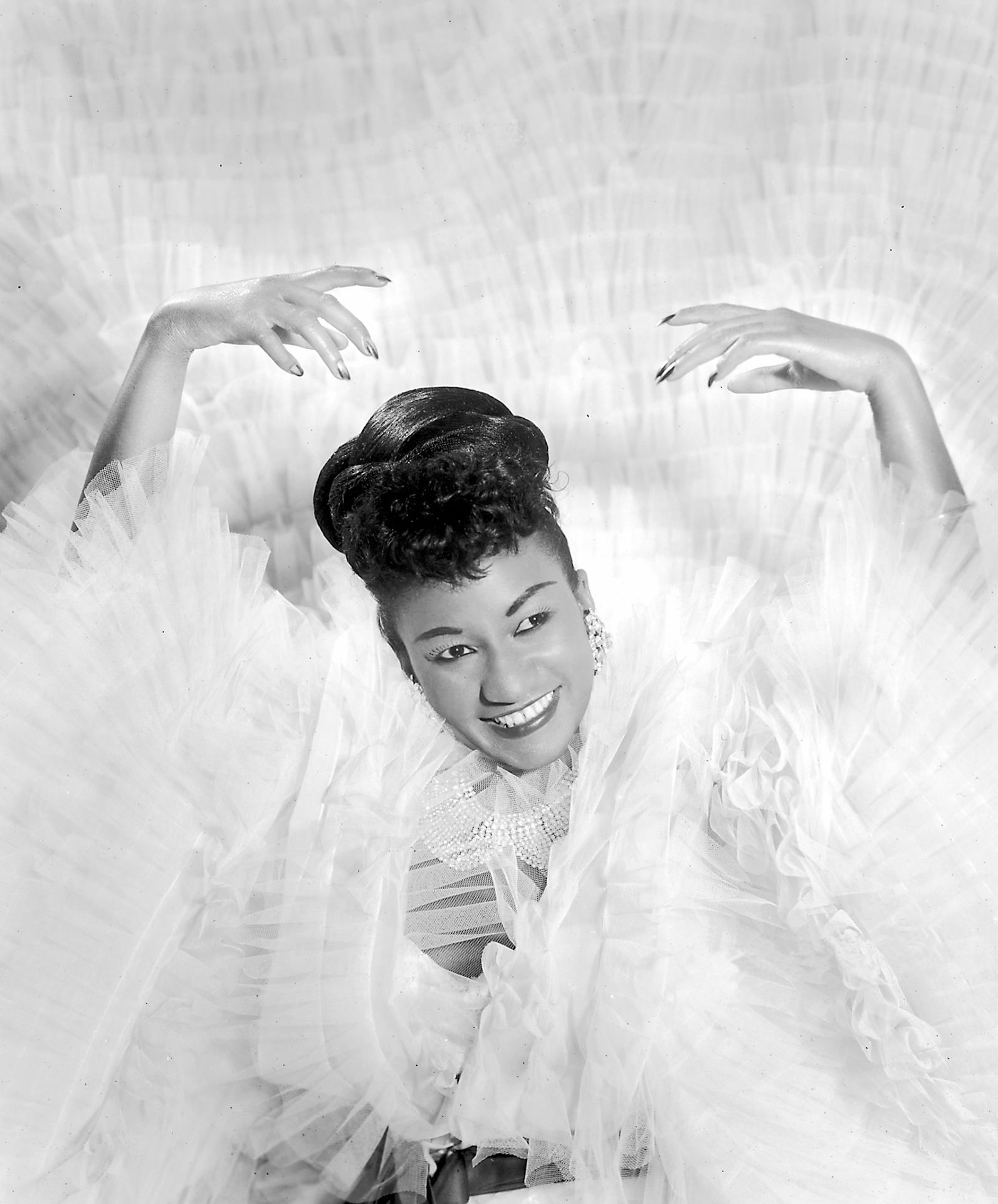 Fotografía cedida por Pinecrest Gardens donde aparece la 'Reina de la salsa', la cantante cubana Celia Cruz . EFE/Pinecrest Gardens /SOLO USO EDITORIAL /NO VENTAS /SOLO DISPONIBLE PARA ILUSTRAR LA NOTICIA QUE ACOMPAÑA /CRÉDITO OBLIGATORIO