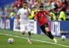 Trezeguet (d), de Egipto, y Ali Nemati, de Irán, en acción durante el partido de la fase de grupos de la Copa Mundial de la FIFA 2026 entre Egipto e Irán en Seattle (EE.UU.). EFE/STEPHEN BRASHEAR
