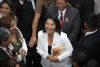 La presidenta de Perú, Keiko Fujimori (c), reacciona durante la vigésimo primera Ceremonia de Acción de Gracias por el Perú este jueves, celebrada por las iglesias evangélicas del país andino, en Lima (Perú). EFE/ Paolo Aguilar
