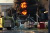 Un bombero combate un incendio en una fábrica de pinturas, en el Parque Industrial de Santa Cruz (Bolivia). EFE/Juan Carlos Torrejón
