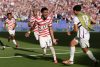 Malik Tillman (17) celebra el segundo gol de Estados Unidos, de au autoría, ante Bosnia y Herzegovina en San Francisco. EFE/EPA/BENJAMIN FANJOY