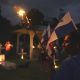 Campesinos sostienen banderas y velas en una vigilia en rechazo al decreto ejecutivo que ordena la clausura de los cementerios comunitarios para dar paso a la construcción del embalse de Río Indio, proyecto impulsado por el Canal de Panamá en la comunidad de Limón de Chagres (Panamá). EFE/Aris Mariota