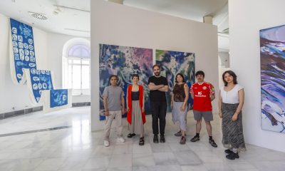 Los comisarios de la muestra titulada 'Los de aquí', María Garberí y Pepo Devesa, con los integrantes del Coletivo Zooa, Cesar Jumpa y Astro Escudero , Nebraska Flores y CAMAL, artistas ecuatorianos que participan en la exposición, en la hacen dialogar el arte contemporáneo con los movimientos migratorios, en Cartagena (España), con motivo del Festival Mar de Músicas, este año dedicado a Ecuador. EFE/Marcial Guillén