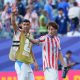 Matías Galarza (d) y Fabián Balbuena de Paraguay, este sábado, tras el partido que enfrentó a su selección con la de Francia, correspondiente a los octavos de final del Mundial de la FIFA 2026 en el estadio de Filadelfia (Estados Unidos). EFE/ Angel Colmenares