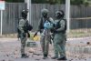 Policías inspeccionan el lugar donde ocurrió un atentado terrorista este sábado, en Cúcuta (Colombia). EFE/ Mario Caicedo
