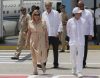El presidente de Colombia, Gustavo Petro (d), camina junto a la viceministra de Relaciones Exteriores de Cuba, Josefina Vidal, antes salir este sábado, del aeropuerto internacional José Martí en La Habana (Cuba). EFE/ Norlys Pérez POOL